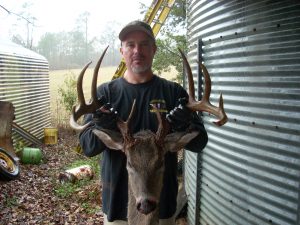 Mike Cox of Chambers County, Alabama harvested this 151 in. 10 point while using DEER HERE Acorn Attractant.  Mike states that the buck was following a doe, and she was licking the DEER HERE from leaves and twigs, which had been sprayed earlier as he entered his stand.  